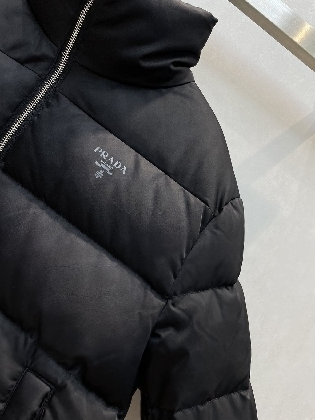 Prada Black Quilted Logo Puffer Jacket — detail