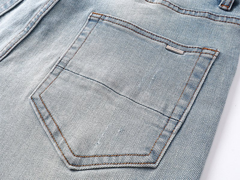 AMIRI Light Blue Patch Detail Slim Tapered Jeans