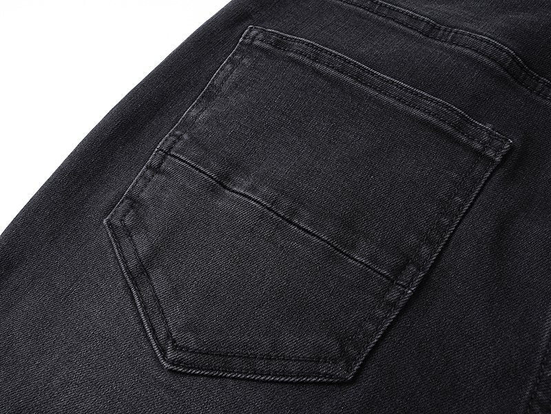 AMIRI Distressed Slim Tapered Jeans