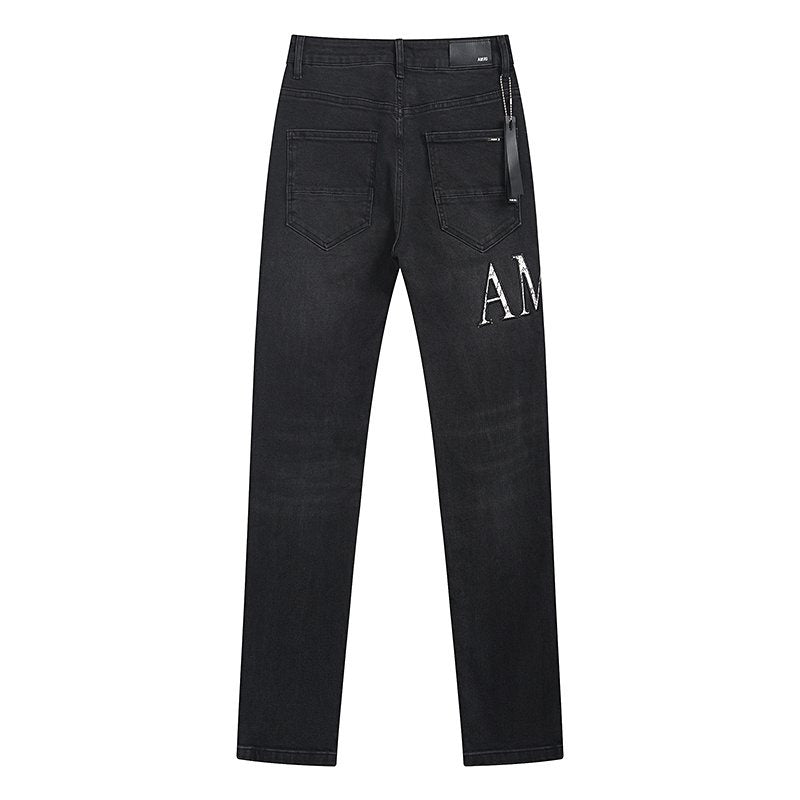 AMIRI Distressed Slim Tapered Jeans