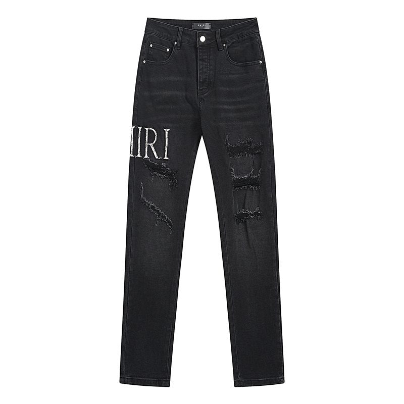 AMIRI Distressed Slim Tapered Jeans