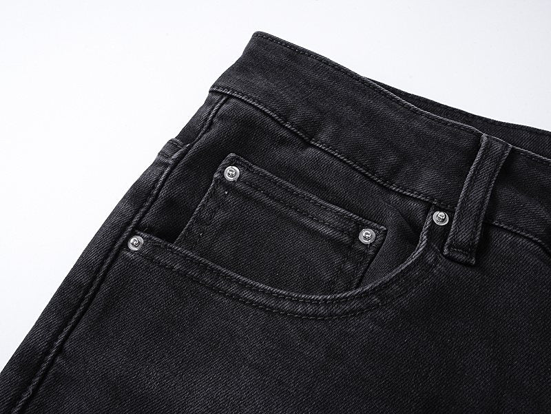 AMIRI Distressed Slim Tapered Jeans