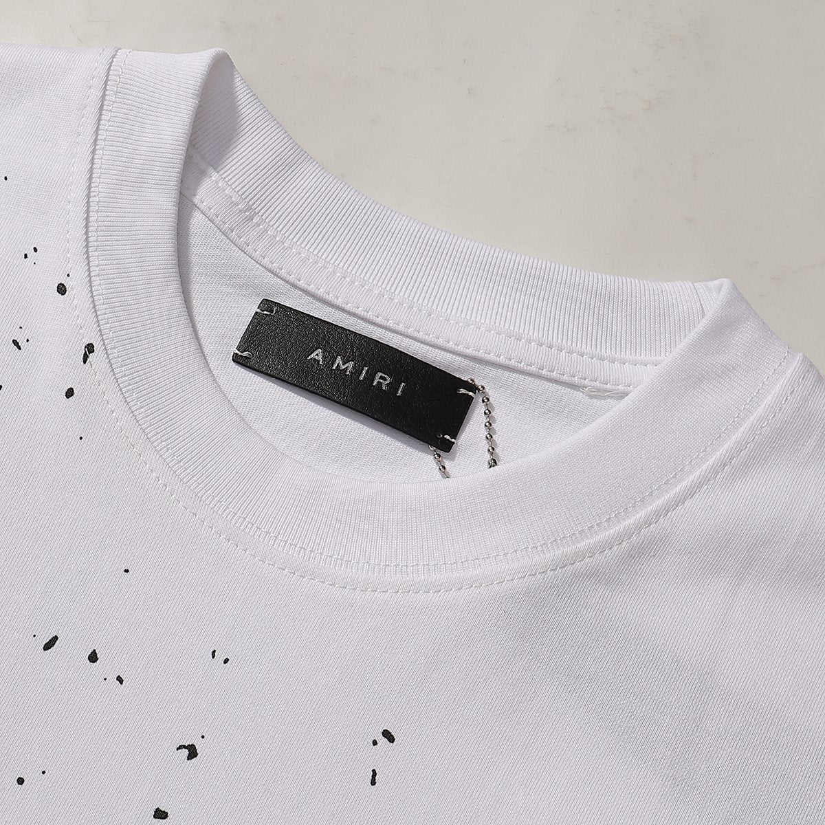 AMIRI Paint Splatter Graphic T-Shirt