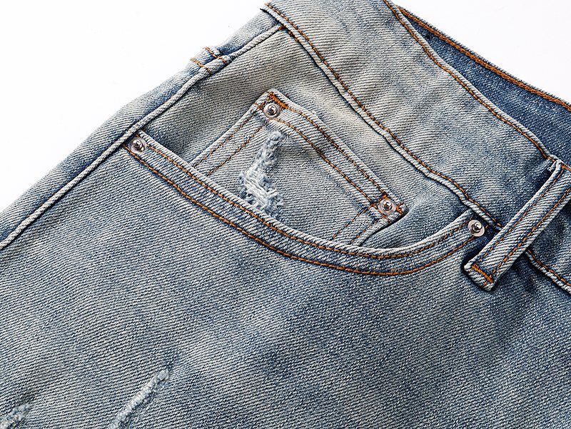 AMIRI Light Blue Distressed Monogram Denim Shorts