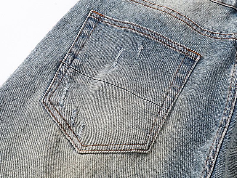 AMIRI Light Blue Distressed Monogram Denim Shorts
