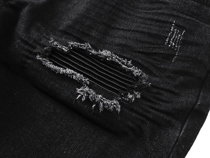 AMIRI Black Distressed Ribbed Knee Jeans