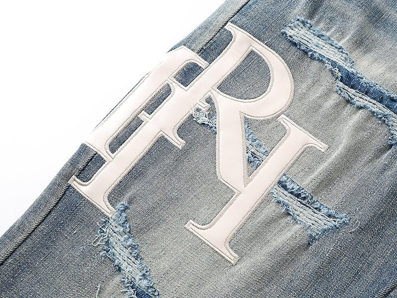 AMIRI Light Blue Distressed Letter Graphic Jeans