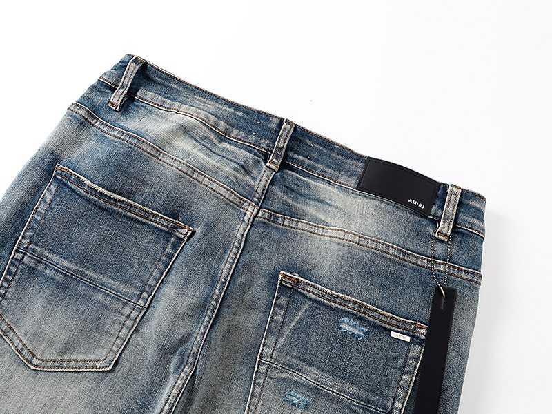 AMIRI Light Blue Distressed Letter Graphic Jeans