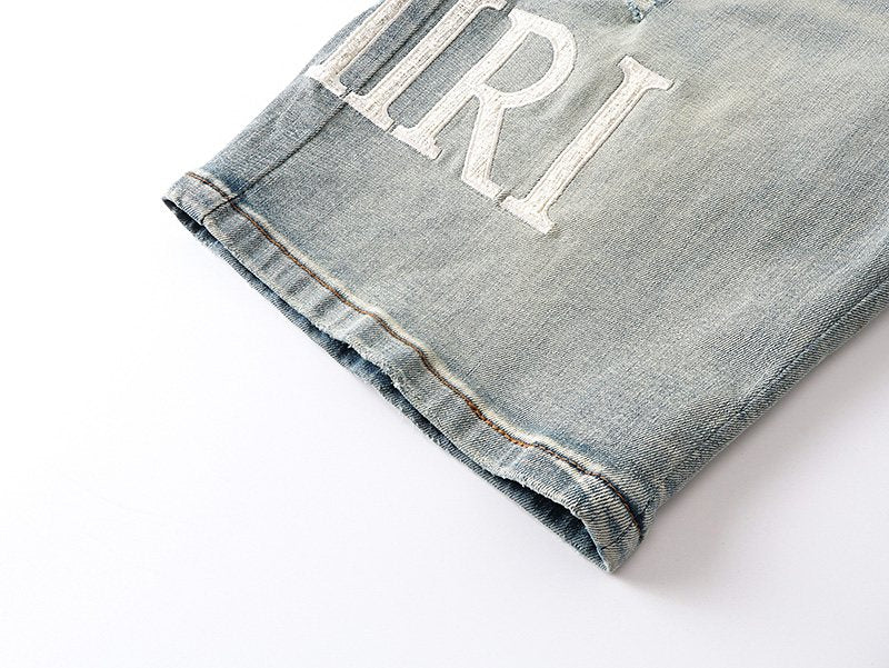 AMIRI Light Blue Distressed Denim Shorts