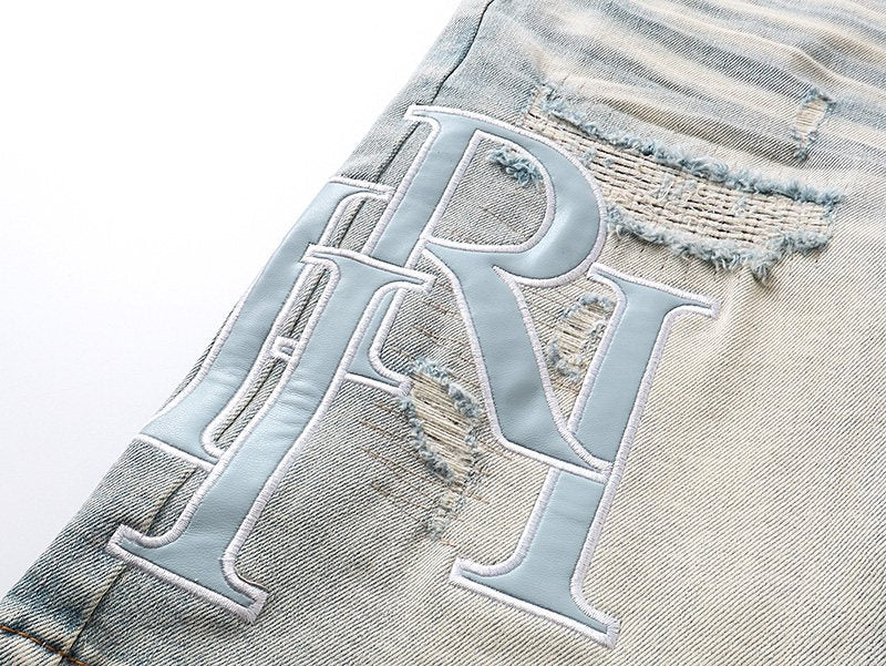 AMIRI Light Blue Monogram Denim Shorts