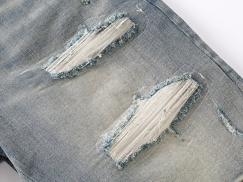 AMIRI Light Blue Distressed Denim Shorts
