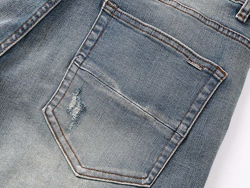 AMIRI Light Blue Distressed Denim Shorts