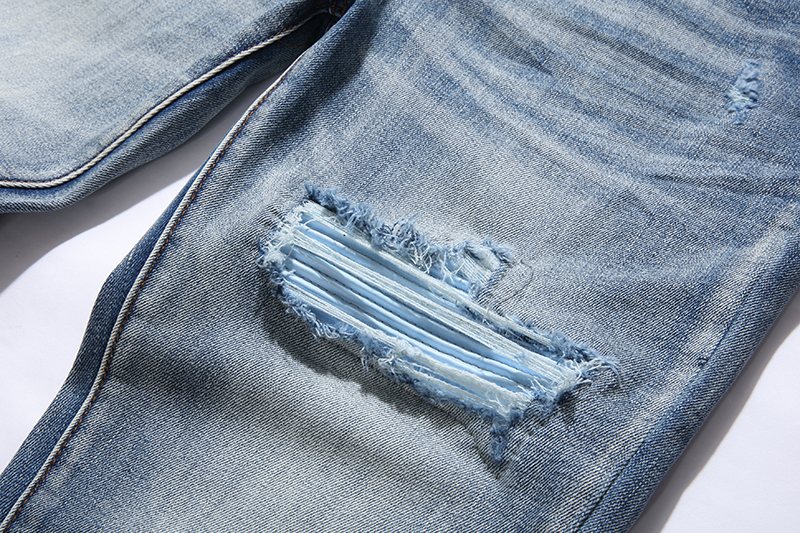 Amiri Light Blue Distressed Denim Jeans