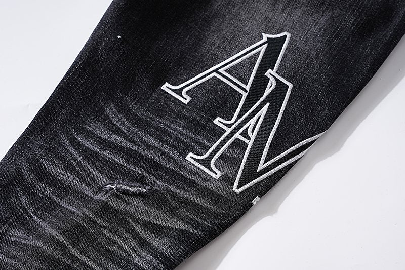 AMIRI Black Distressed Letter Graphic Jeans