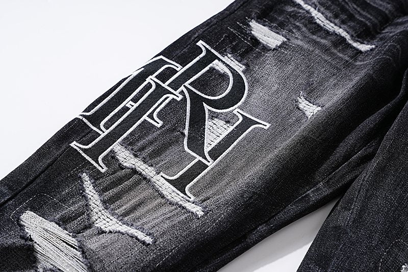 AMIRI Black Distressed Letter Graphic Jeans