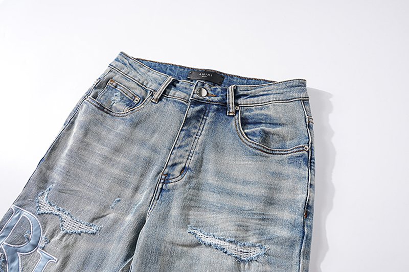 AMIRI Light Blue Letter Graphic Distressed Jeans