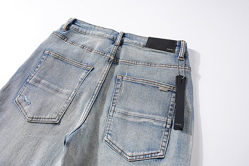 AMIRI Light Blue Letter Graphic Distressed Jeans