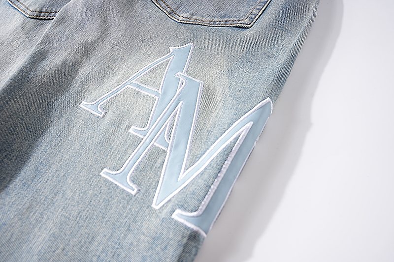 AMIRI Light Blue Letter Graphic Distressed Jeans