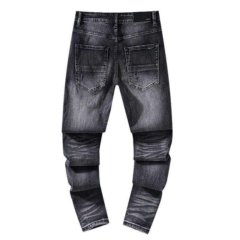 AMIRI Washed Black Distressed Jeans