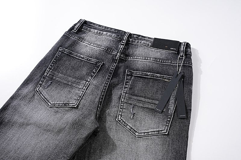 AMIRI Washed Black Distressed Jeans