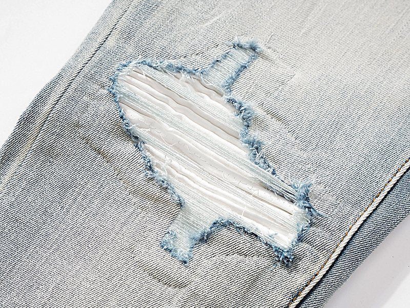 AMIRI Light Blue Distressed Ripped Knee Jeans