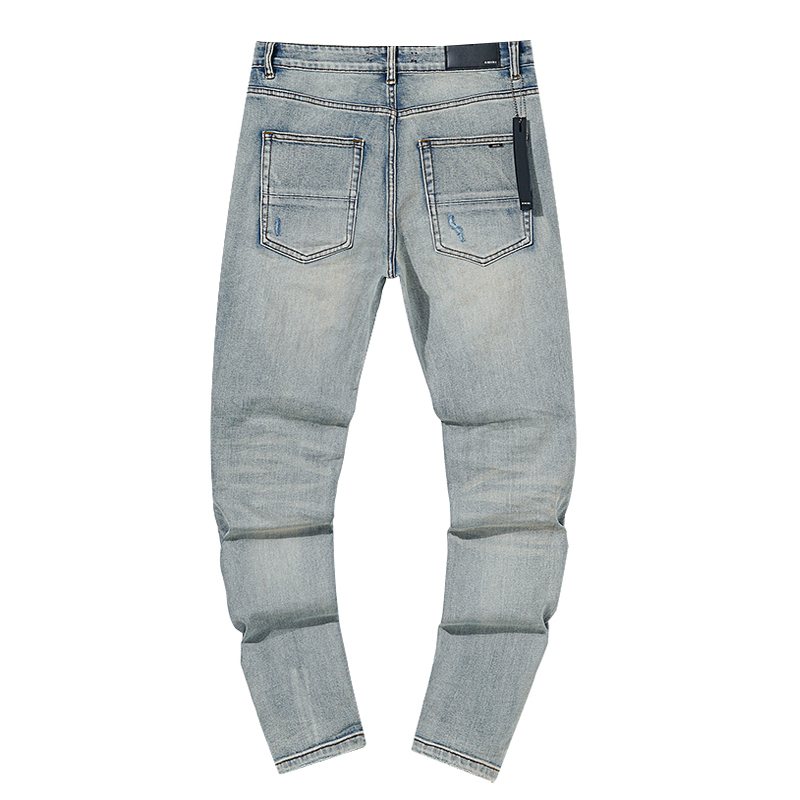 AMIRI Light Blue Distressed Ripped Knee Jeans