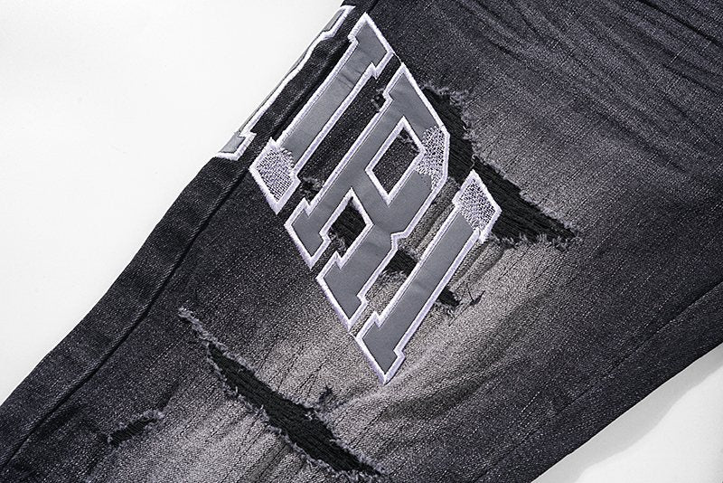AMIRI Distressed Washed Black Graphic Jeans