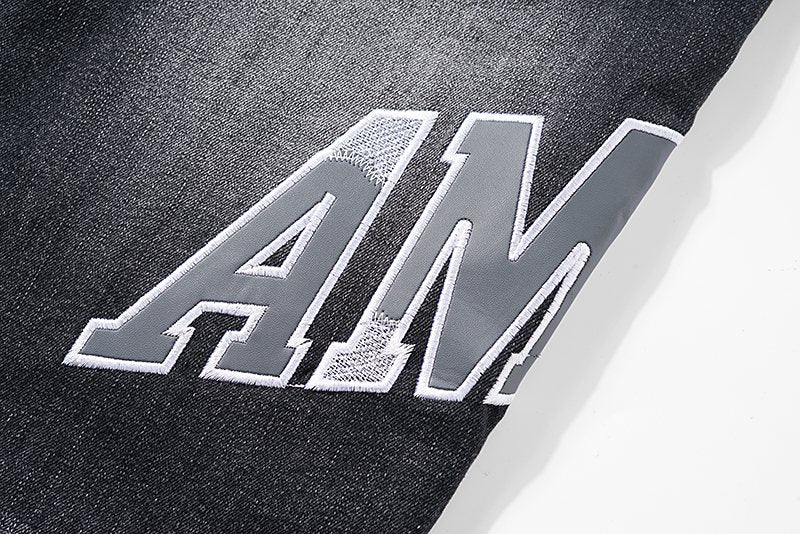 AMIRI Distressed Washed Black Graphic Jeans