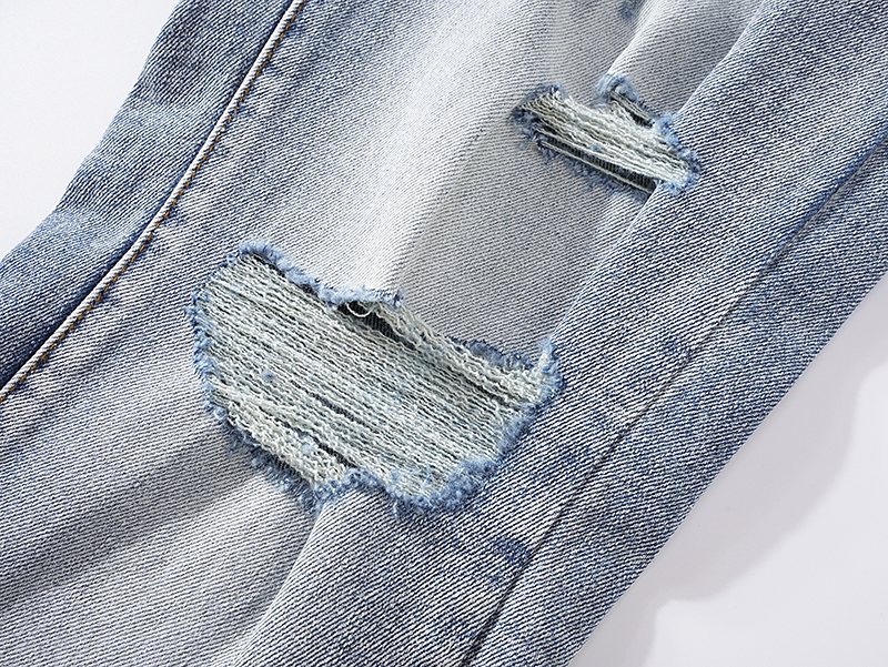 AMIRI Light Blue Distressed Ripped Knee Jeans
