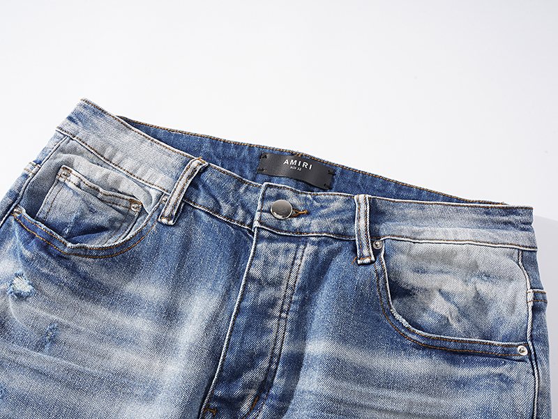 AMIRI Light Blue Distressed Ripped Knee Jeans