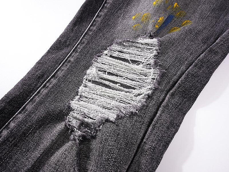 AMIRI Paint-Splatter Distressed Jeans