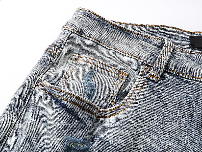 AMIRI Light Blue Distressed Paint Splatter Jeans