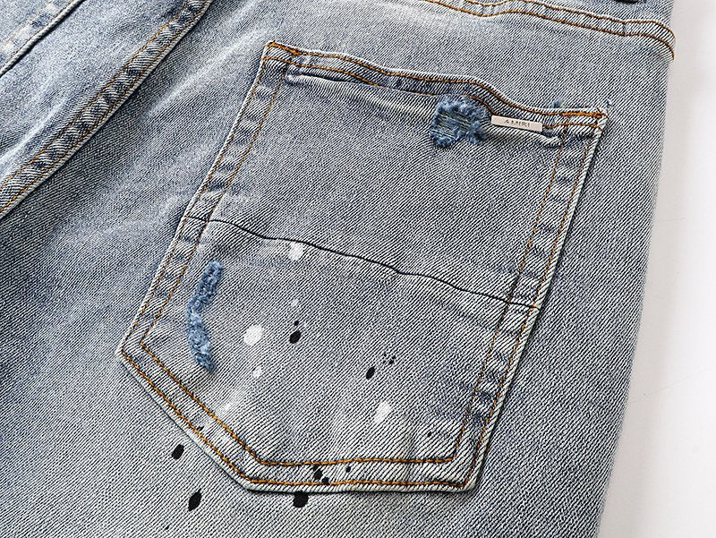 AMIRI Light Blue Distressed Paint Splatter Jeans