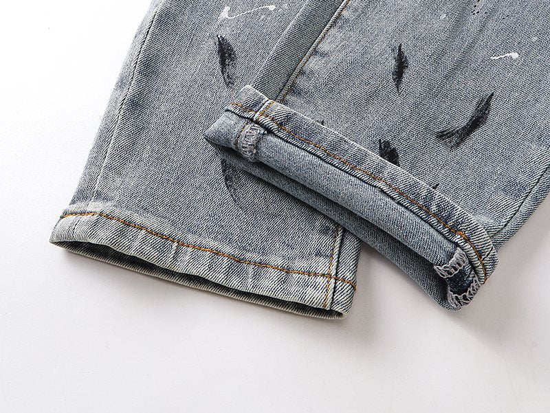 AMIRI Light Blue Distressed Paint Splatter Jeans