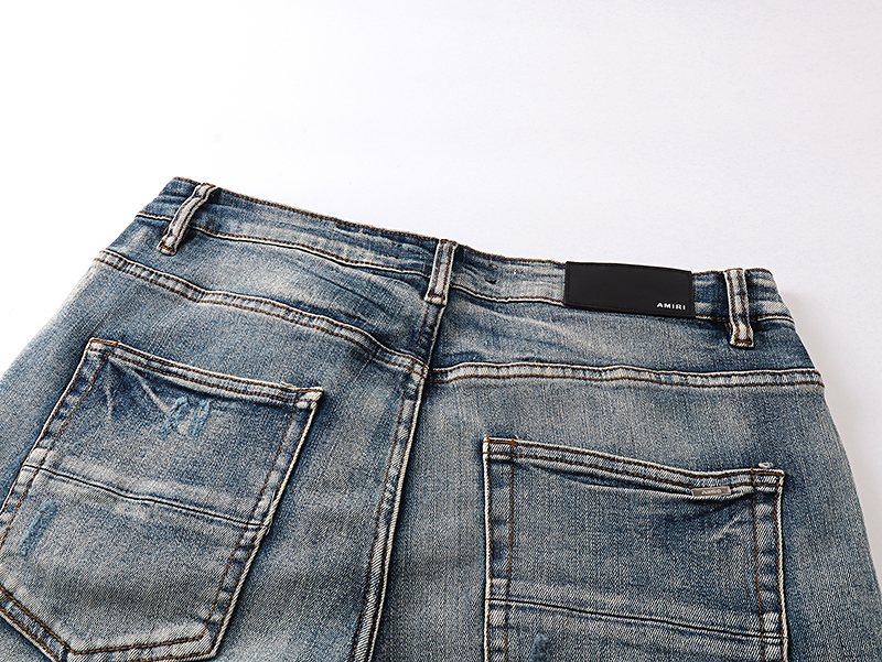 AMIRI Light Blue Distressed Letter Applique Jeans
