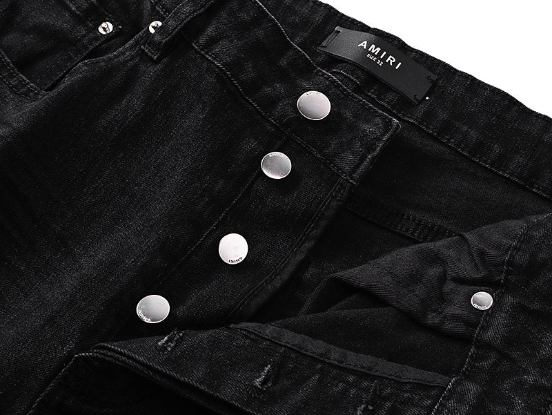 AMIRI Black Distressed Ribbed Knee Jeans