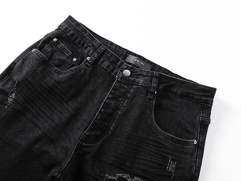 AMIRI Black Distressed Ribbed Knee Jeans