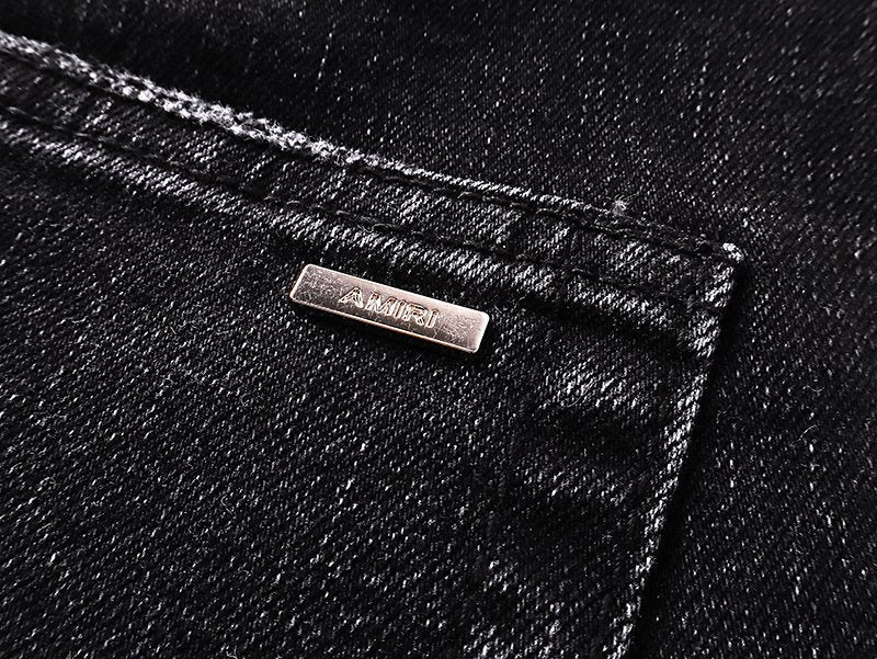 AMIRI Varsity Letter Appliqué Distressed Jeans