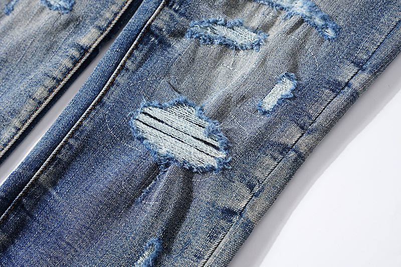 Amiri Varsity Letter Patch Distressed Jeans