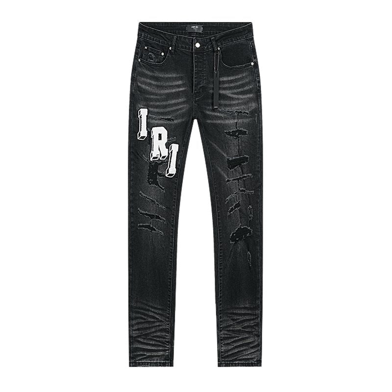 Amiri Varsity Letter Patch Distressed Jeans