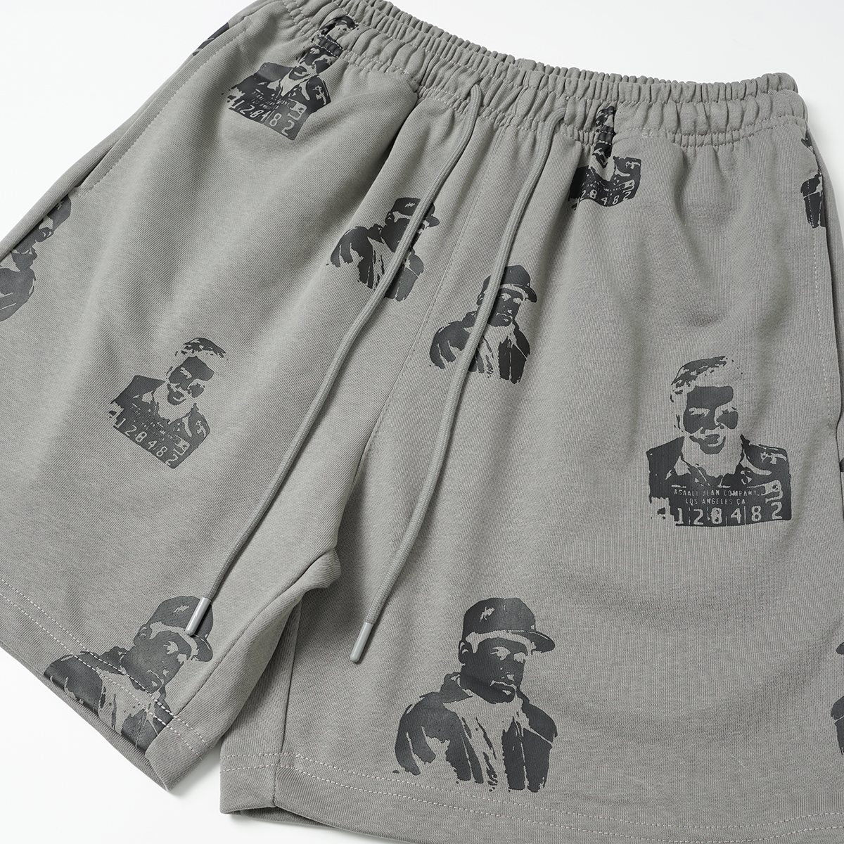 ASAALL All-Over Portrait Graphic Drawstring Shorts